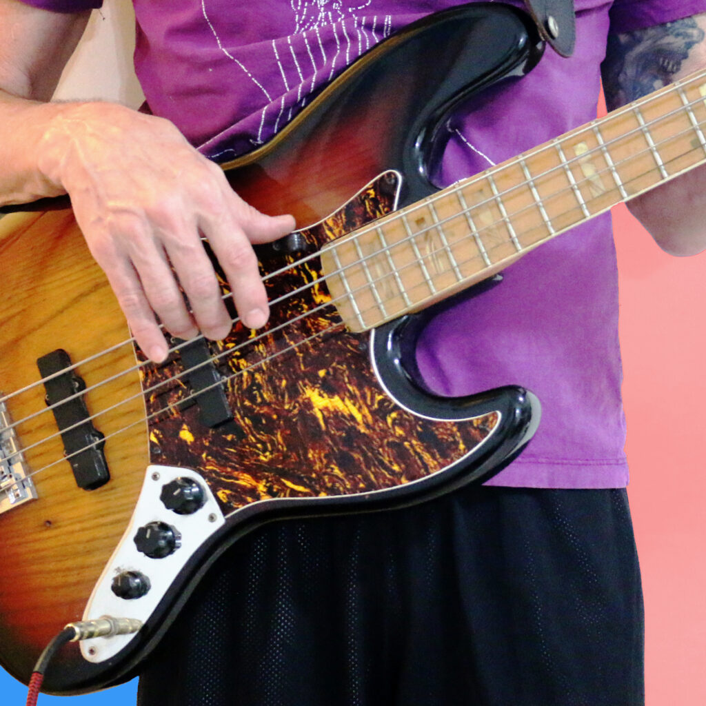 Zede Eng plays bass